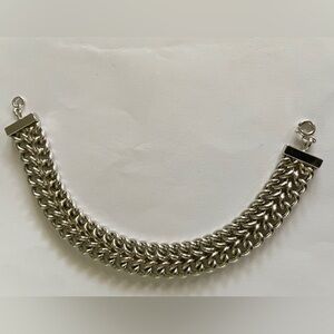 Unmarked. Beautiful silver tone bracelet